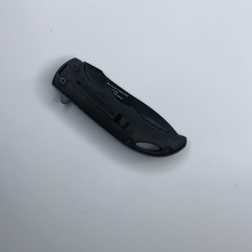 black back of folded knife