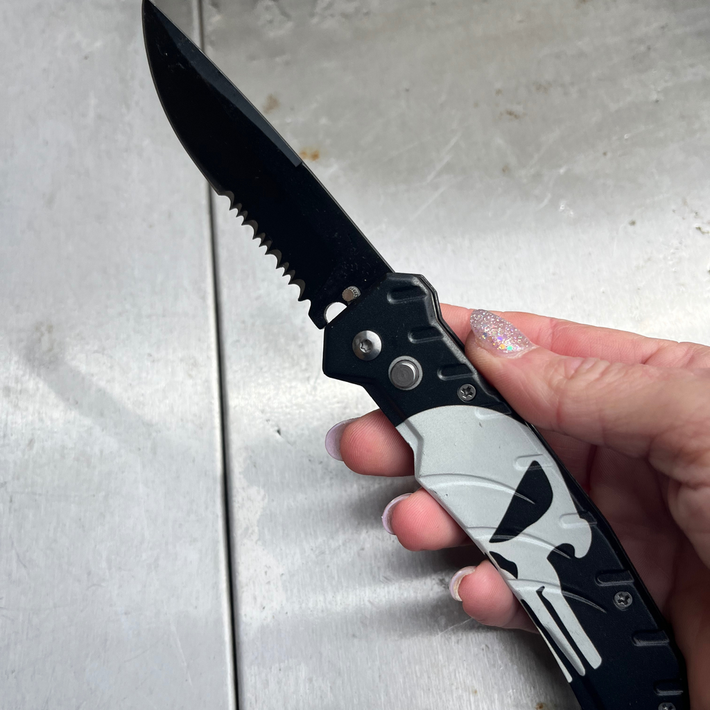 Black Switchblade partially serrated blade 