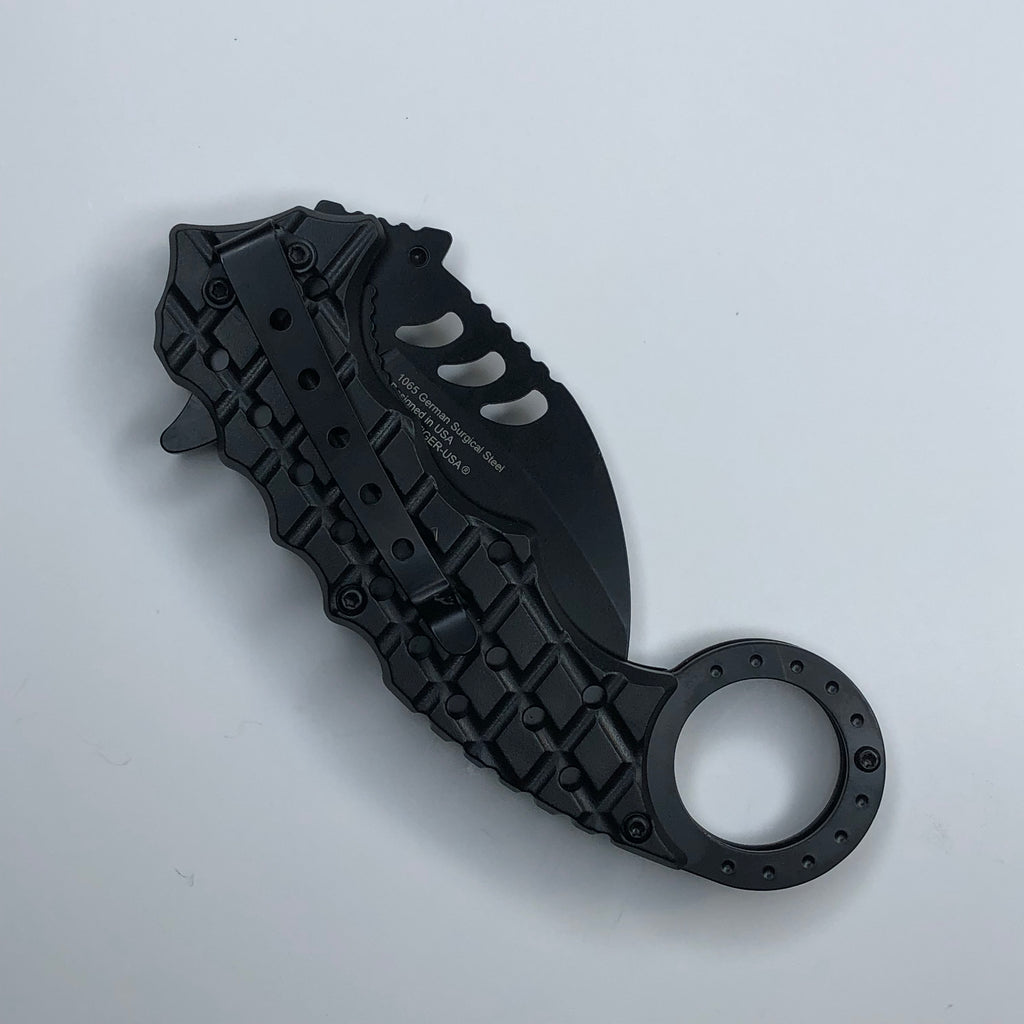 Back of folded USA karambit